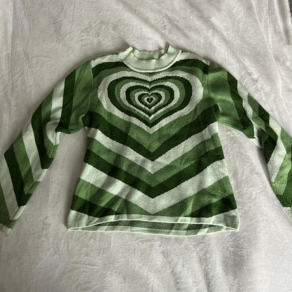 Green heart-shaped sweater